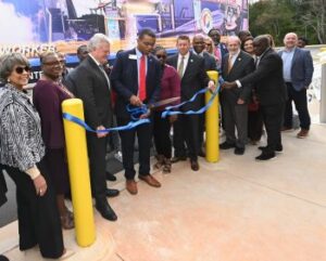 Supporters gather as GPTC President Tavarez Holston cuts the ribbon on the new CDL Range in Newton County